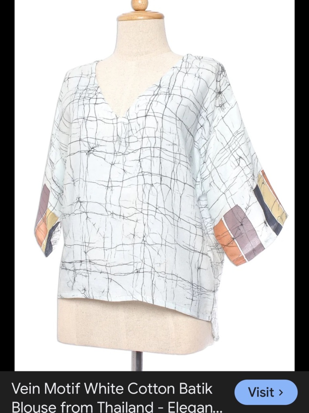 Relaxed White Vein-Print Batik Blouse with Color-Block Cuffs